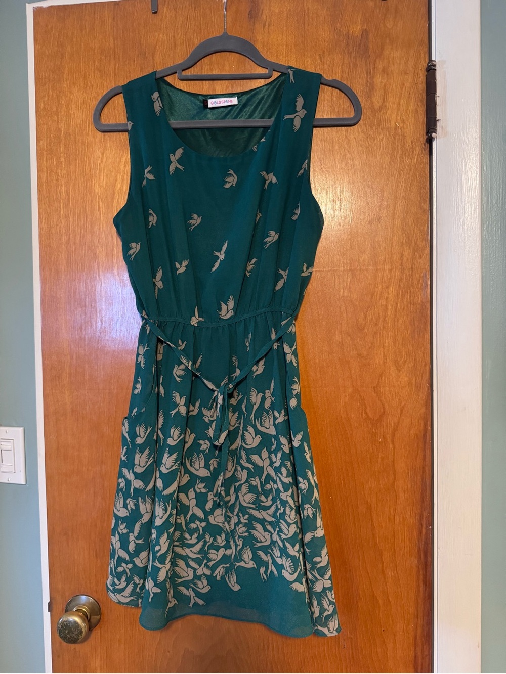 Green Sleeveless Dress with Bird Print and Pockets